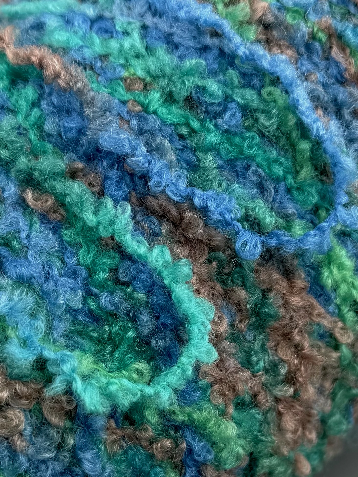 Corallo Bouclé 240m/100g – Merino Extrafine und Seide mit Elastan Blau-Grün Melange